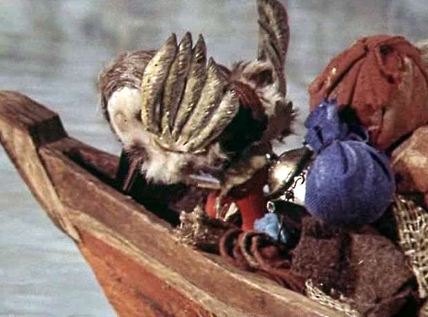 Дятел долбит дырку в лодке, кадр из мультфильма